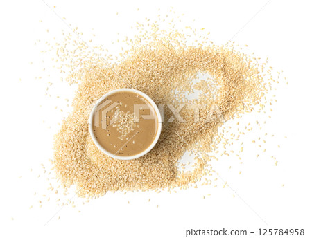 Tahini, sesame seeds paste, tahina sauce, eastern dip, traditional oriental ground sesame Tahini, sesame seeds paste, tahina sauce, eastern dip, traditional oriental ground sesame 125784958