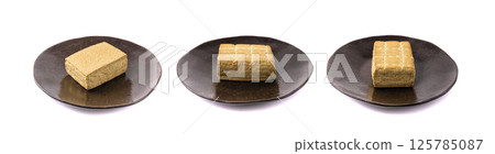 Tofu Cheese Isolated, Smoked Vegan Cheese Slice, Sliced Soya Bean Curd, Soy Protein or TSP 125785087