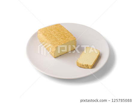 Tofu Cheese Isolated, Smoked Vegan Cheese Slice, Sliced Soya Bean Curd, Soy Protein or TSP 125785088
