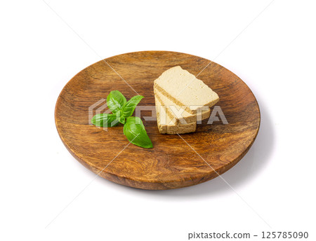 Tofu Cheese Isolated, Smoked Vegan Cheese Slice, Sliced Soya Bean Curd, Soy Protein or TSP 125785090