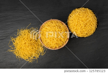 Raw vermicelli, gold soup pasta, small scattered homemade noodles, thin macaroni 125785123