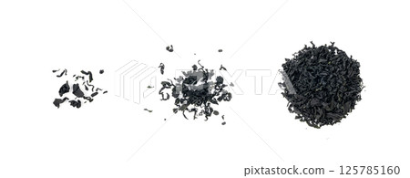 Wakame seaweed pieces isolated, edible raw algae, dry undaria pinnatifida healthy food kelp 125785160