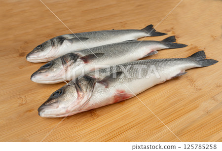 European seabass or Dicentrarchus labrax, whole raw labrax, branzino fish, European bass 125785258