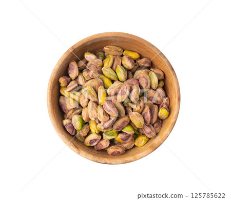 Fried salt pistachio nuts isolated. Baked pistachios pile, roasted green pistache fruits on white 125785622