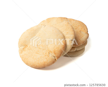 Pita flat bread, wheaten pitta flatbread also known as Arabic bread, chapati, greek pita naan, khubz Pita flat bread, wheaten pitta flatbread also known as Arabic bread, chapati, greek pita naan, khubz 125785630