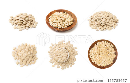 Whole Pumpkin Seeds in Shell Isolated, Raw Pepita Grains, Scattered Green Healthy Nuts 125785657
