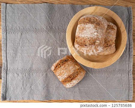 Brown rye bun, square gluten free bread, whole grain healthy breakfast bread 125785686