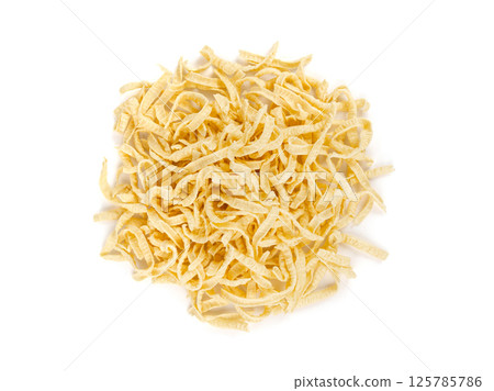 Passatelli spatzle pasta isolated, raw spaetzle noodles, dry homemade german macaroni Passatelli spatzle pasta isolated, raw spaetzle noodles, dry homemade german macaroni 125785786