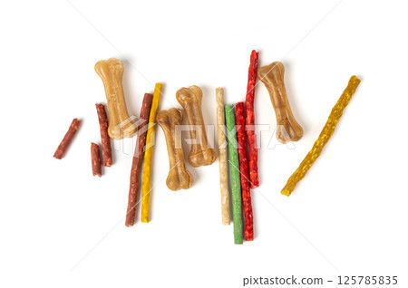 Rawhide chew sticks for dogs, colorful collagen dog food, pressed dry kibble, dental care treats Rawhide chew sticks for dogs, colorful collagen dog food, pressed dry kibble, dental care treats 125785835