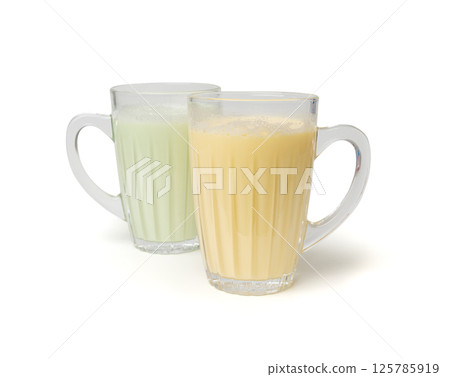 Vanilla milk shake in glass. Milkshake on yellow background, white whey protein smoothie Vanilla milk shake in glass. Milkshake on yellow background, white whey protein smoothie 125785919