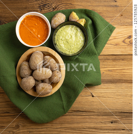 Red mojo rojo and green mojo verde sauces, traditional Tenerife dips, mojo picon dressing 125785928