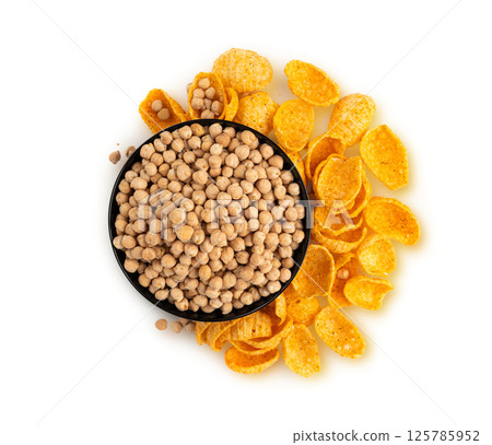 Hummus chickpea chips, chick pea crisps pile, healthy orange snack, fried legume crunchies 125785952