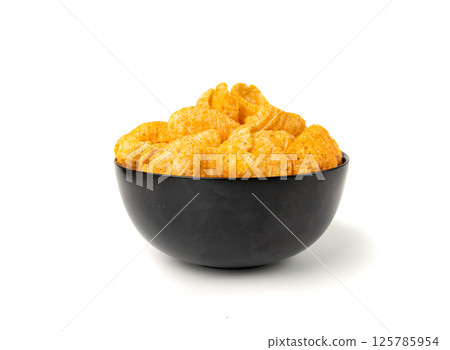 Hummus chickpea chips, chick pea crisps pile, healthy orange snack, fried legume crunchies Hummus chickpea chips, chick pea crisps pile, healthy orange snack, fried legume crunchies 125785954