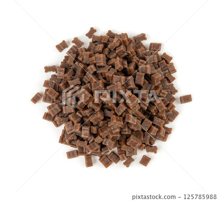 Mini bone-shaped pet food, small dogs crunchy treats, flavored brown dry kibble, canine food Mini bone-shaped pet food, small dogs crunchy treats, flavored brown dry kibble, canine food 125785988