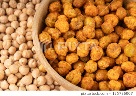 Roasted chickpeas, leblebi pile, spicy fried chana, crispy chick peas with mint and spices, east snack Roasted chickpeas, leblebi pile, spicy fried chana, crispy chick peas with mint and spices, east snack 125786007