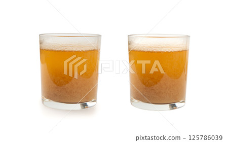 Maca powder drink isolated, dry Peruvian ginseng beverage, powder in water, ground ayak willku tea Maca powder drink isolated, dry Peruvian ginseng beverage, powder in water, ground ayak willku tea 125786039