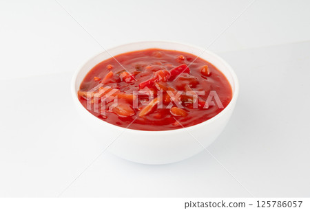 Tomato sauce with vegetables isolated, red sweet and sour pasta marinara sauce, mexican dip smear 125786057