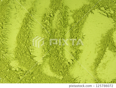 Matcha powder texture background, green tea dust pattern, flour banner, powdered chlorella Matcha powder texture background, green tea dust pattern, flour banner, powdered chlorella 125786072