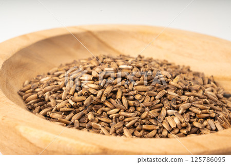 Milk thistle seeds, silybum marianum grains, dry blessed milkthistle fruits, variegated thistle kernels 125786095