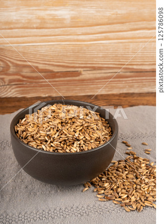 Milk thistle seeds, silybum marianum grains, dry blessed milkthistle fruits, variegated thistle kernels Milk thistle seeds, silybum marianum grains, dry blessed milkthistle fruits, variegated thistle kernels 125786098