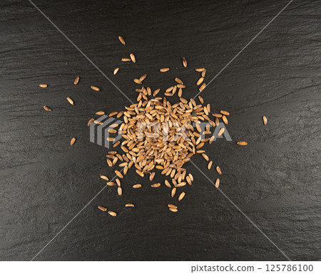 Milk thistle seeds, silybum marianum grains, dry blessed milkthistle fruits, variegated thistle kernels Milk thistle seeds, silybum marianum grains, dry blessed milkthistle fruits, variegated thistle kernels 125786100