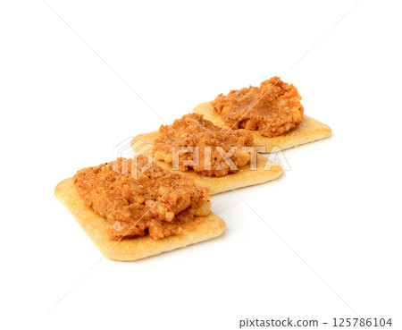 Paprika stew, Szczecin paprikash, traditional Polish fish spread with rice, tomato paste, vegetables on white 125786104