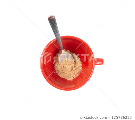 Maca powder drink isolated, dry Peruvian ginseng beverage, powder in water, ground ayak willku tea 125786233