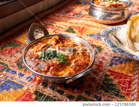 Butter paneer masala. Cottage cheese curry, hot spicy chicken korma, traditional indian food Butter paneer masala. Cottage cheese curry, hot spicy chicken korma, traditional indian food 125786300