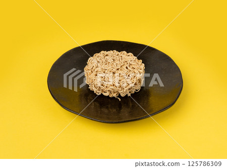 Raw Noodles, Dry Round Ramen Noodle, Uncooked Korea Vermicelli, Chinese Wheat Pasta Raw Noodles, Dry Round Ramen Noodle, Uncooked Korea Vermicelli, Chinese Wheat Pasta 125786309