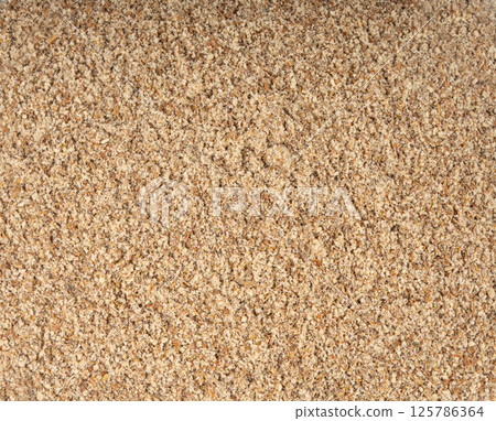 Milk thistle seeds powder, crushed silybum marianum grains pile, milled dry blessed milkthistle Milk thistle seeds powder, crushed silybum marianum grains pile, milled dry blessed milkthistle 125786364
