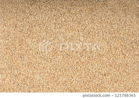 Milk thistle seeds powder, crushed silybum marianum grains pile, milled dry blessed milkthistle Milk thistle seeds powder, crushed silybum marianum grains pile, milled dry blessed milkthistle 125786365