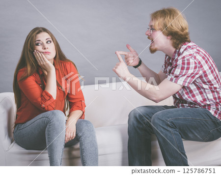 Bored woman and angry man 125786751