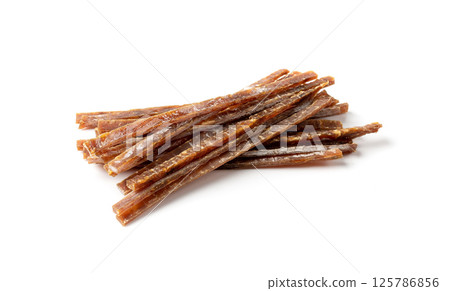 Fish Jerky Isolated, Dry Salted Seafood Snack, Hake Stockfish, Small Pieces of Dehydrated Pollock 125786856