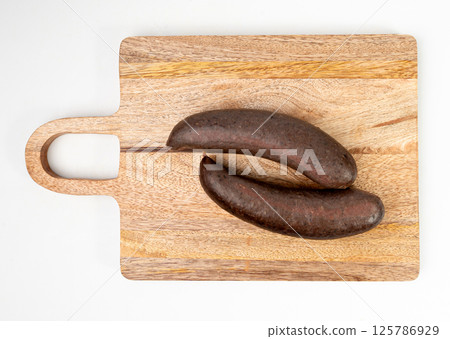 Black pudding isolated, blood sausage kaszanka, traditional Polish terrine, brawn sausages on white 125786929