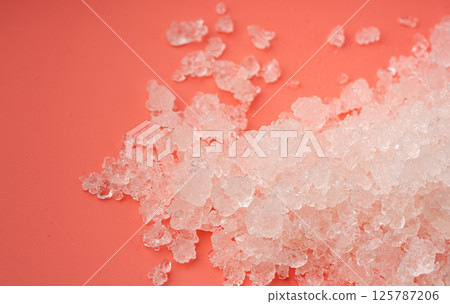 Dead sea salt pile, white crystals for body spa, sodium chloride similar to crushed ice, spa scrub 125787206