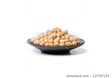 Chickpea, chick pea pile, dry Cicer arietinum fruits, raw Bengal gram legume, garbanzo beans 125787235