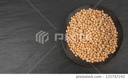 Chickpea, chick pea pile, dry Cicer arietinum fruits, raw Bengal gram legume, garbanzo beans Chickpea, chick pea pile, dry Cicer arietinum fruits, raw Bengal gram legume, garbanzo beans 125787242