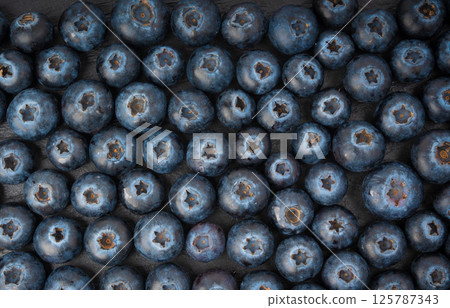 Blueberry texture background. Fresh blue berry fruits pattern, bilberry wallpaper with copy space 125787343