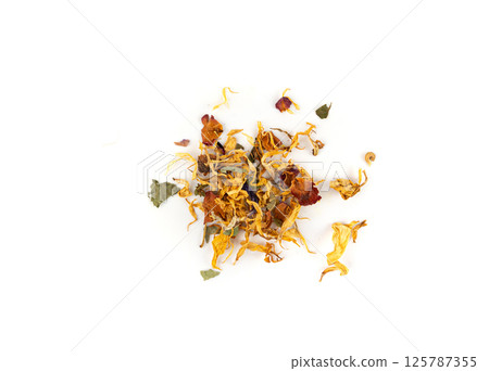 Dried edible flowers mix, Helichrysum arenarium, dwarf everlast, medical herb tea pile isolated Dried edible flowers mix, Helichrysum arenarium, dwarf everlast, medical herb tea pile isolated 125787355