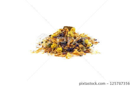 Dried edible flowers mix, Helichrysum arenarium, dwarf everlast, medical herb tea pile isolated 125787356