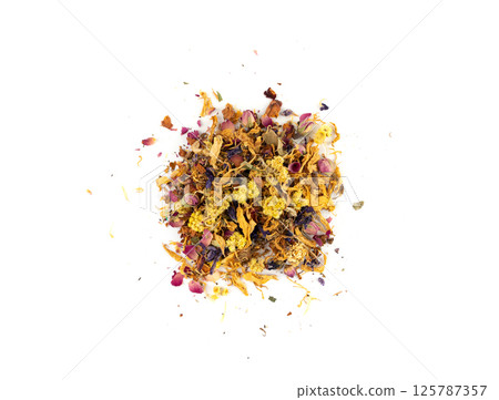 Dried edible flowers mix, Helichrysum arenarium, dwarf everlast, medical herb tea pile isolated 125787357