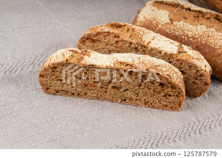 Whole wheat brown bread, fitness pumpkin carrot buns with seeds, cereal bread grain bun Whole wheat brown bread, fitness pumpkin carrot buns with seeds, cereal bread grain bun 125787579