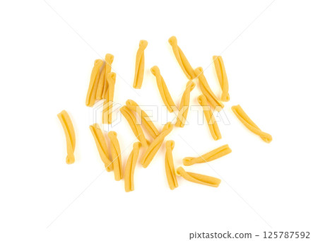Casarecce pasta isolated, dry traditional macaroni, raw casarecce, wheat noodles, Italy cuisine ingredient Casarecce pasta isolated, dry traditional macaroni, raw casarecce, wheat noodles, Italy cuisine ingredient 125787592