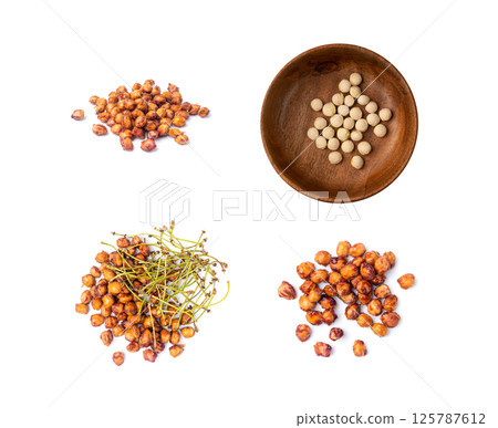Cherry Stones Isolated, Cherry Core Pile Closeup, Sweet Fruit Kernels, Cherries Pits, Dry Prunus Avium Seeds 125787612