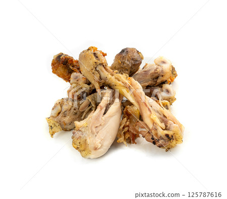 Chicken Leftovers, Unfinished Grilled Chicken on Dirty Plate Isolated, Meat Pieces and Bones after Dinner 125787616