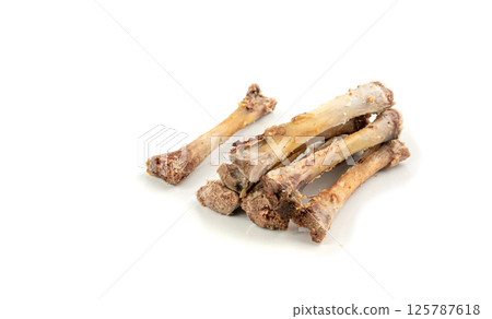 Chicken Leftovers Isolated, Cleanly Gnawed Bones, Gnawed Bare Bones after Dinner, Eaten Clean Lunch 125787618