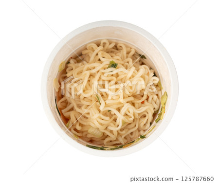 Dry instant noodles in cup isolated. Raw spaghetti in a plastic cup, fast food pasta in container 125787660
