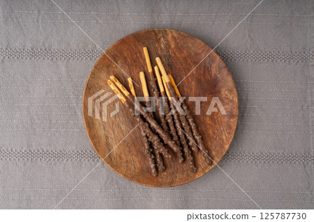 Chocolate cookie sticks, long choco pastries, japan biscuit tubes, korea cracker sticks 125787730