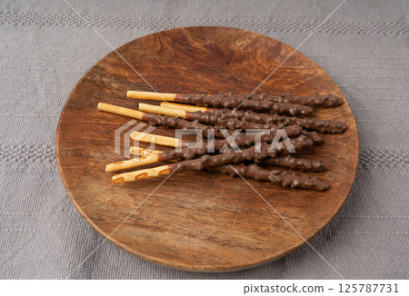 Chocolate cookie sticks, long choco pastries, japan biscuit tubes, korea cracker sticks 125787731