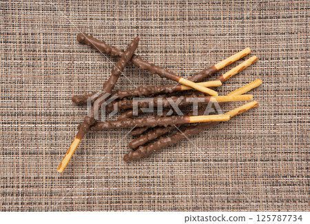 Chocolate cookie sticks, long choco pastries, japan biscuit tubes, korea cracker sticks 125787734